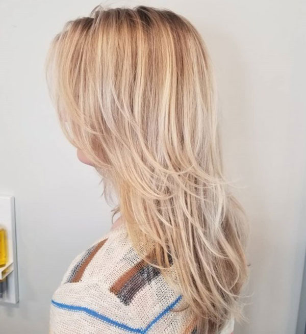 Blonde Haircut with Cute Light Feathers